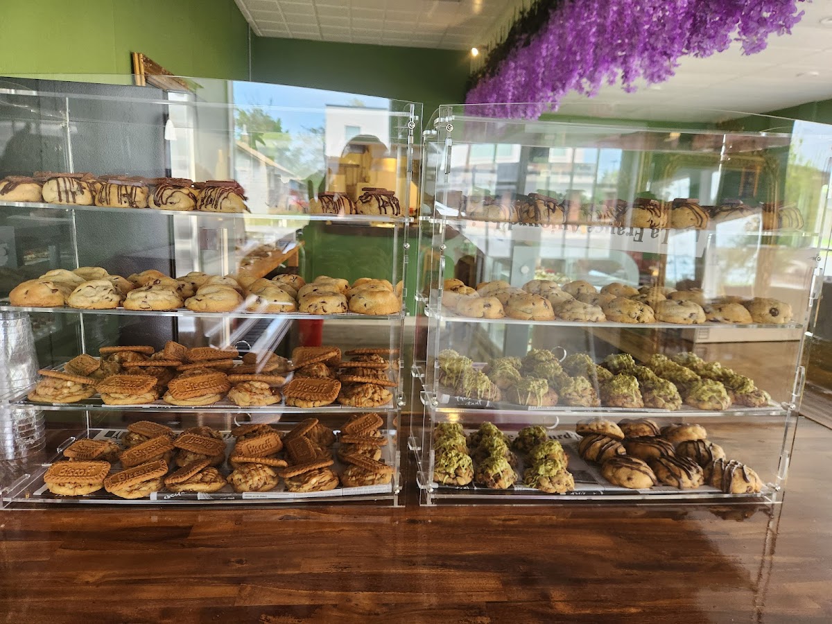 Display cases full of fresh-baked cookies and pastries